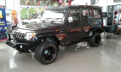 Modified Mahindra Bolero front three quarter spied at a dealership