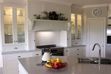 Simple Provincial kitchen by Logic Cabinets. Caesarstone Clamshell ...