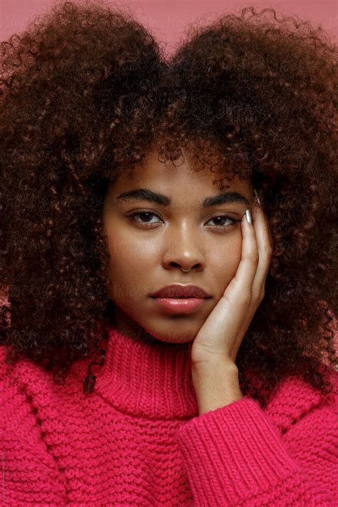 "Portrait Of A Young African American Afro Woman In Pink Studio" by Stocksy Contributor ...