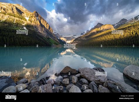 Lake Louise in Banff National Park at sunrise Stock Photo - Alamy