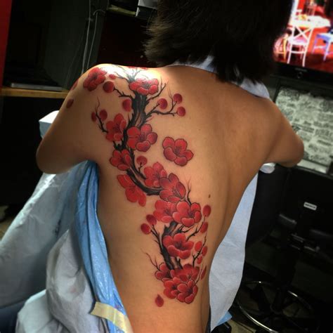 japanese cherry blossom tattoo on back - Piedad Benjamin