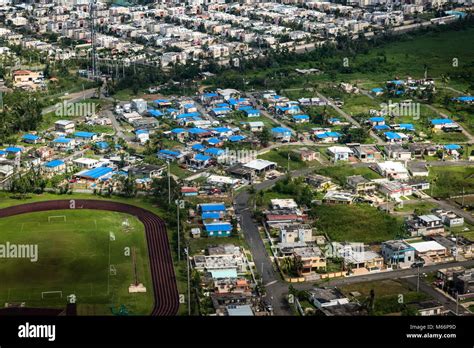 Bayamon, Puerto Rico, Feb. 13, 2018--Blue roofs are visible in the town ...