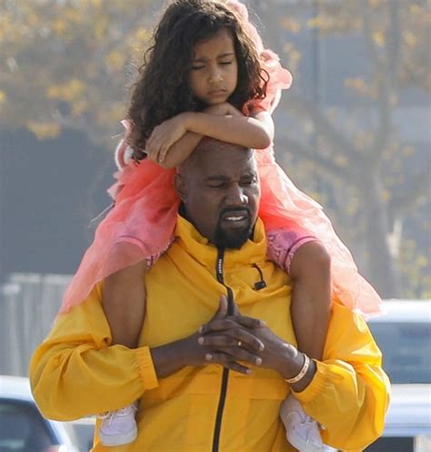 Kanye West is pure Kanye West as he gives North piggyback on day out ...