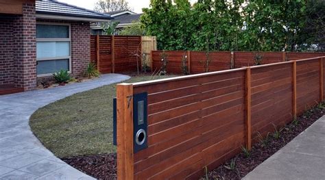 Letterbox in timber fence | Front yard fence, Front yard decor ...