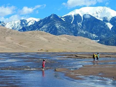 Medano Creek begins seasonal flow in Colorado’s Great Sand Dunes ...