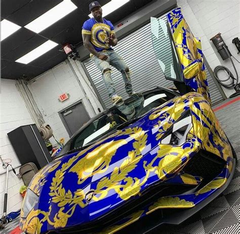 American Rapper 50cent, Poses With His Versace-Wrapped Lamborghini ...