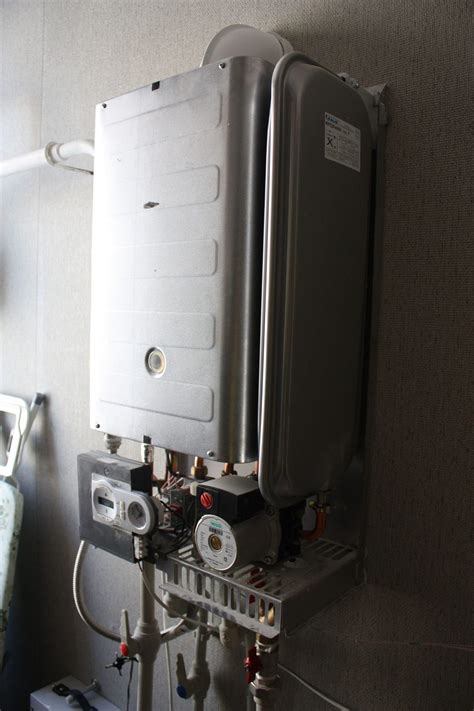 How do I replace a water heater gas burner assembly? - Combi Boiler ...