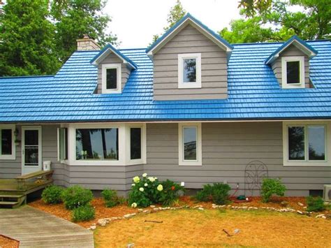 Found on Bing from americanmetalroofswi.com | House exterior blue ...