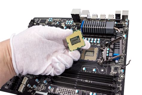 Premium Photo | Installation of modern processor in cpu socket on the ...