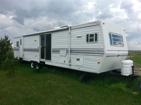 Must sell=$reduced$=1998 Dutchmen 36 ft bumper pull camper with large ...