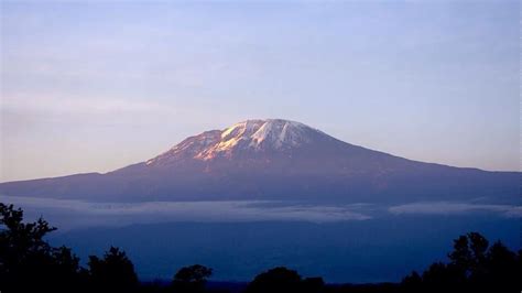 Mt. Kilimanjaro at sunset. | Kilimanjaro, Natural landmarks, Landmarks