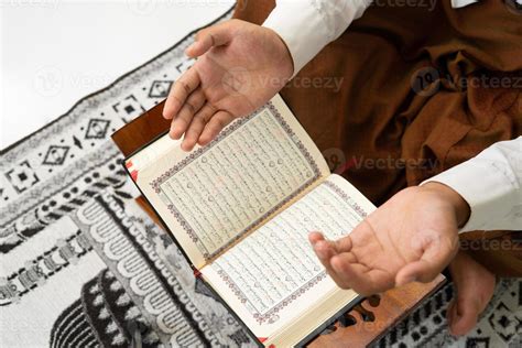 Man Raising both hands to pray 20450067 Stock Photo at Vecteezy