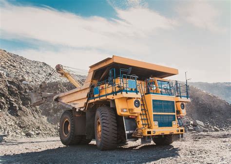 Quarry Mining in a Quarry by Machines Stock Image - Image of gold ...