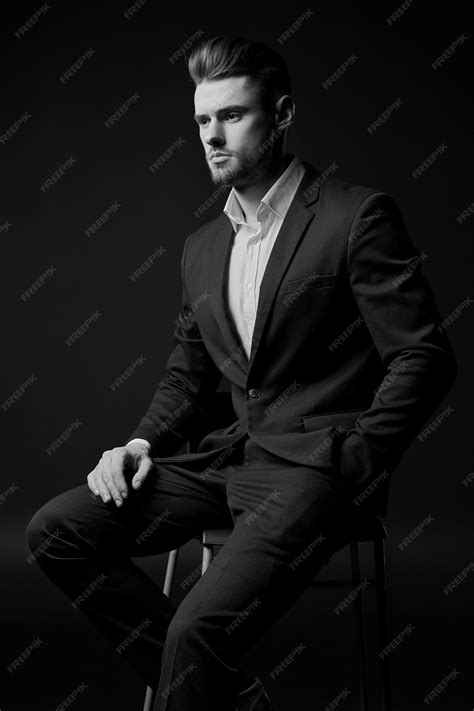 Premium Photo | A young man in a suit. the man with the beard. Male ...