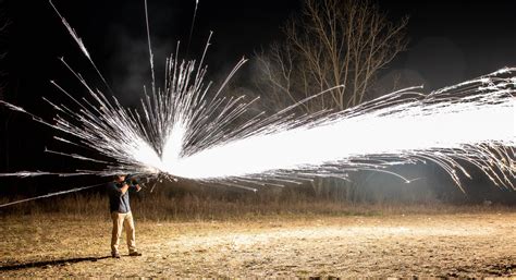 Long exposure of shooting a dragon's breath shotgun shell : r/pics