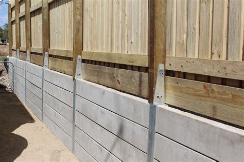 Pioneer Smooth Grey Concrete Sleeper retaining wall with a timber fence ...