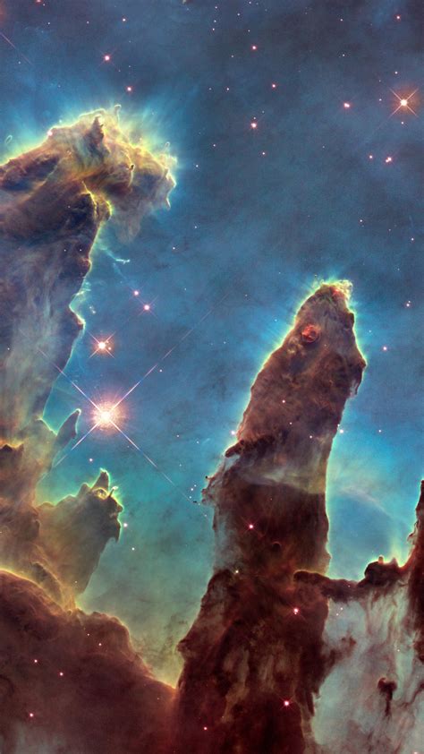 Download wallpaper: The Eagle Nebula's Pillars of Creation 1440x2560