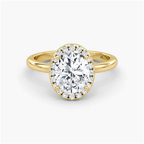 The Halo Oval Engagement Ring in Yellow gold | VRAI