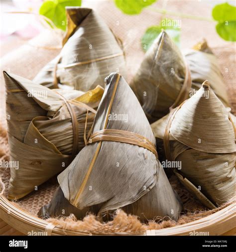 Rice dumpling or zongzi. Traditional steamed sticky glutinous rice ...