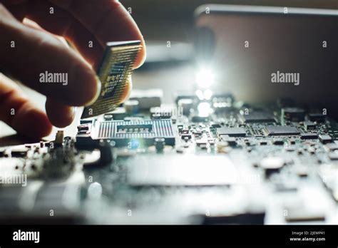 Installation of processor in CPU socket Stock Photo - Alamy