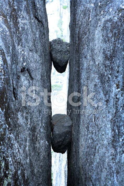 Between A Rock And A Hard Place Stock Photo | Royalty-Free | FreeImages