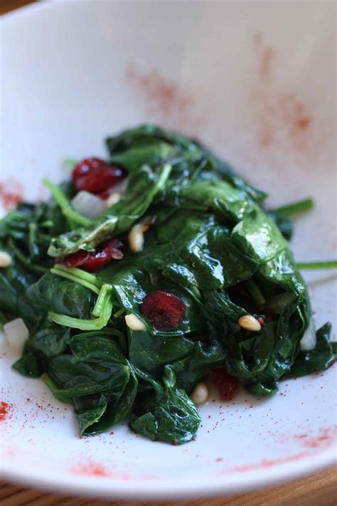 Wilted Spinach Salad with Cranberries and Pine nuts - For The Feast