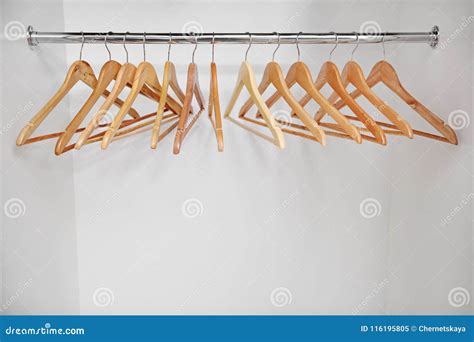 Wooden coat hangers stock image. Image of house, personal - 116195805