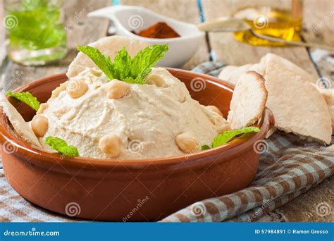 Hummus sauce stock image. Image of rosemary, cuisine - 57984891