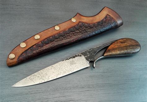 Hey all! Here's a Blacksmith's knife I finished up recently. 5160 and ...