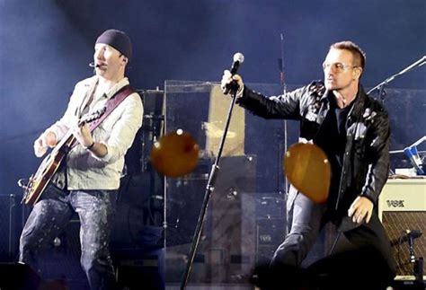 U2 guitarist The Edge spectacularly falls off stage mid-song during ...