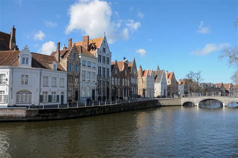 Blue Sky and a Sunny Day at a Canal in Brugge, Belgium Editorial Stock ...