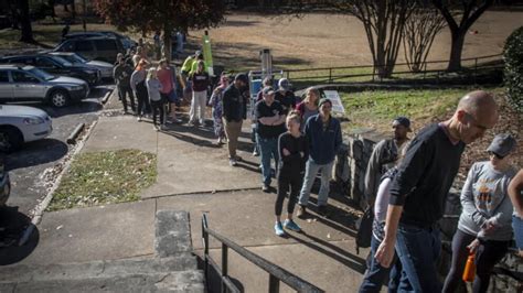 Video Polls set to open in Georgia Senate runoff after record-breaking ...