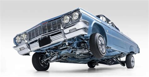 custom lowrider 1964 chevrolet impala convertible tilts and pumps over ...