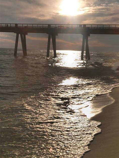 Navarre Beach Pier Surf Photo by jamie garland | 6:05 pm 25 Oct 2013