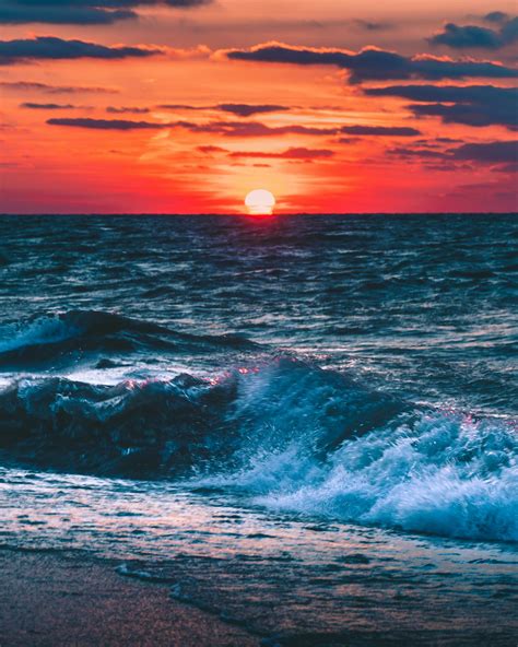 Photo of Ocean During Sunset · Free Stock Photo