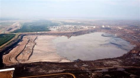 Oilsands tailings ponds to be limited by new rules, Alberta says | CBC News