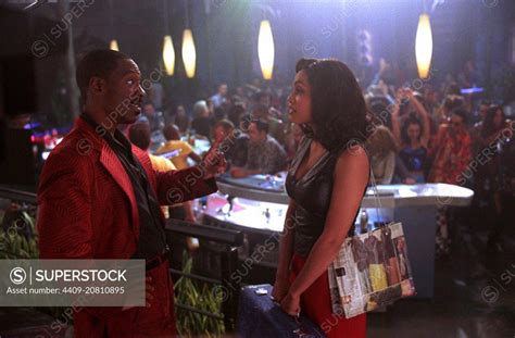 EDDIE MURPHY and ROSARIO DAWSON in THE ADVENTURES OF PLUTO NASH (2002 ...