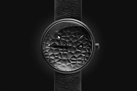 This textured watch-face breaks the monotony of minimalist watch design ...