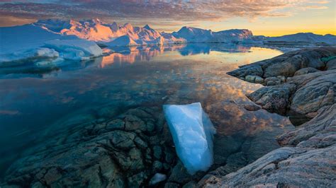 Clouds over Ilulissat Icefjord at scenic dusk, Greenland | Greenland ...