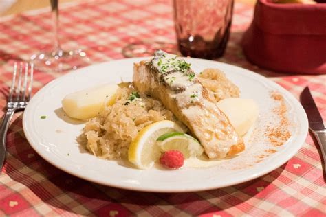 Food to try in Alsace France including Tarte Flambee and Choucroute