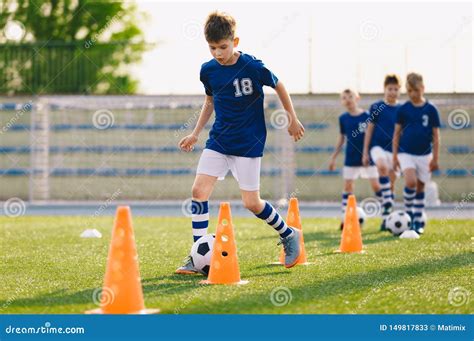 Football Drills: the Slalom Drill. Youth Soccer Practice Drills Stock ...