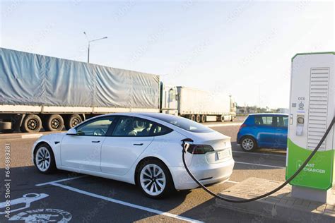 Minsk, Belarus. September 2023 Tesla Model S, EV charging. . Charging a ...