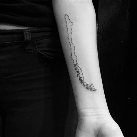 Chile map tattoo located on the inner forearm, fine