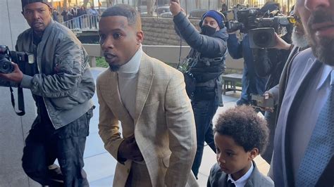 Tory Lanez Arrives at Court with Son