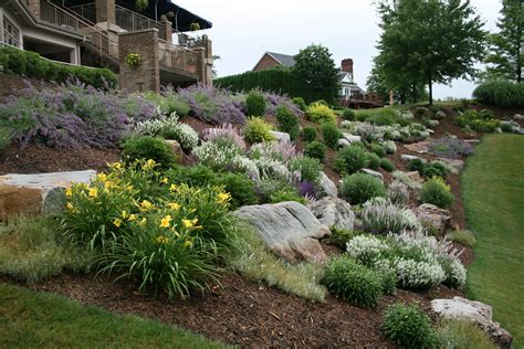 Don't know what to do with that hillside? Boulders, along with ...