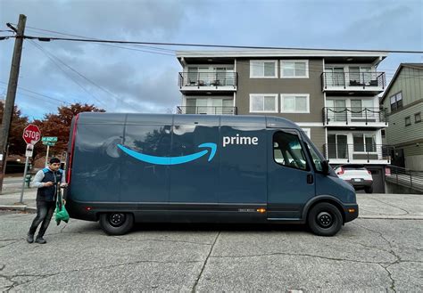 'It's like driving a spaceship': Amazon's Rivian electric delivery vans ...