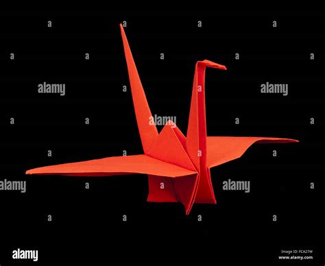 Red crane bird origami Stock Photo - Alamy