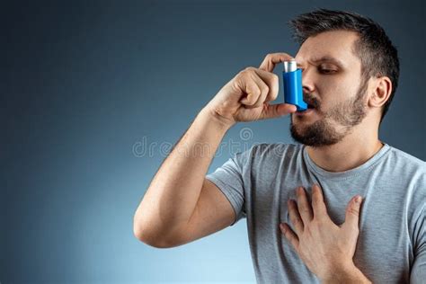 Portrait of a Man with an Asthma Inhaler in His Hands, an Asthmatic ...