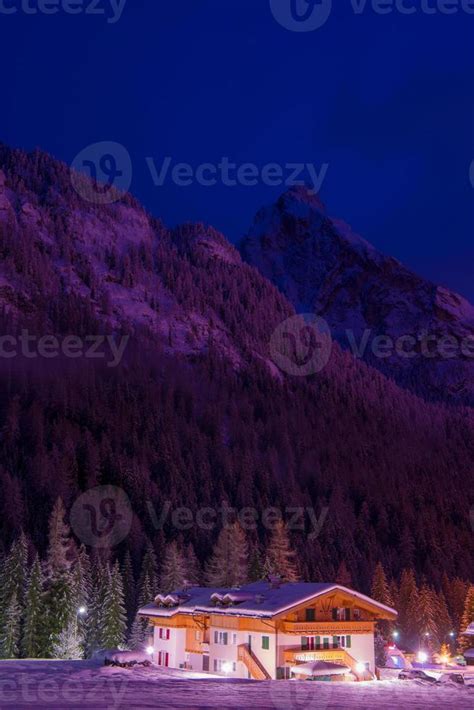 mountain village in alps at night 10683491 Stock Photo at Vecteezy