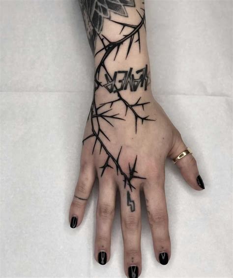 Lightening thorn tattoo by Tine DeFiore - Tattoogrid.net